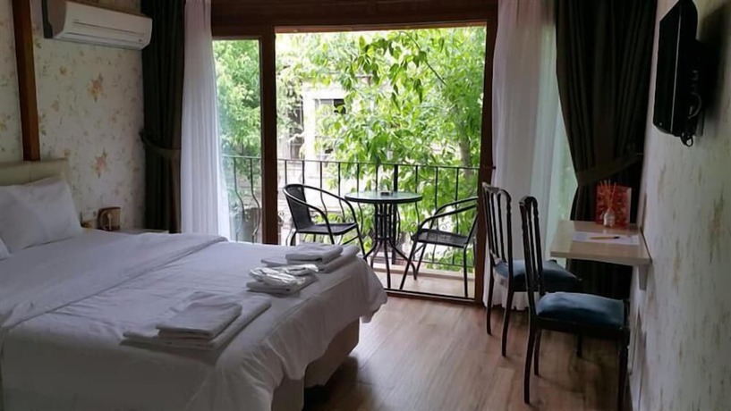 Imagen de la habitación del Buyukada Cinar Hotel. Foto 2