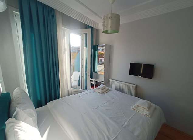Imagen de la habitación del Buyukada Cinar Hotel. Foto 12
