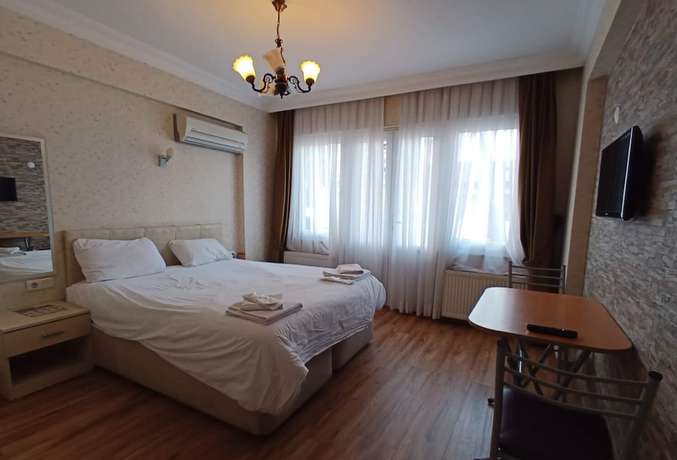 Imagen de la habitación del Buyukada Cinar Hotel. Foto 17