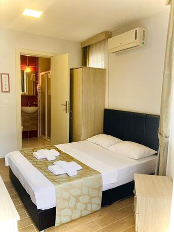 Imagen de la habitación del Bybassios Hotel. Foto 20
