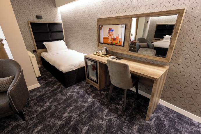 Imagen de la habitación del COMFORT HOUSE, Ortahisar. Foto 3