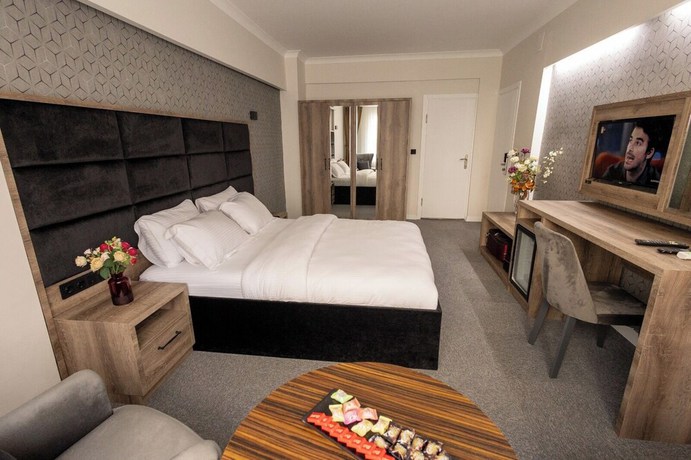 Imagen de la habitación del COMFORT HOUSE, Ortahisar. Foto 8