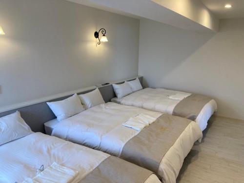 Imagen de la habitación del COZYSTAY IN トゥリバー宮古島. Foto 19