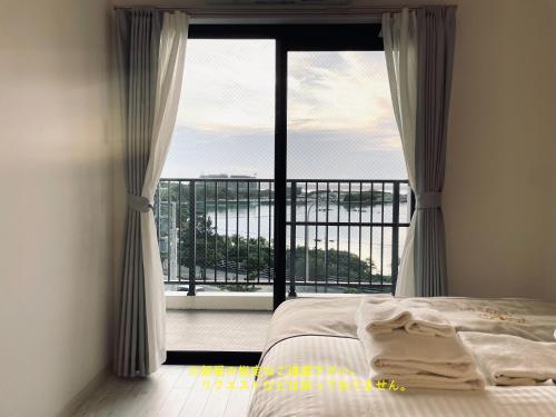 Imagen de la habitación del COZYSTAY IN トゥリバー宮古島. Foto 20