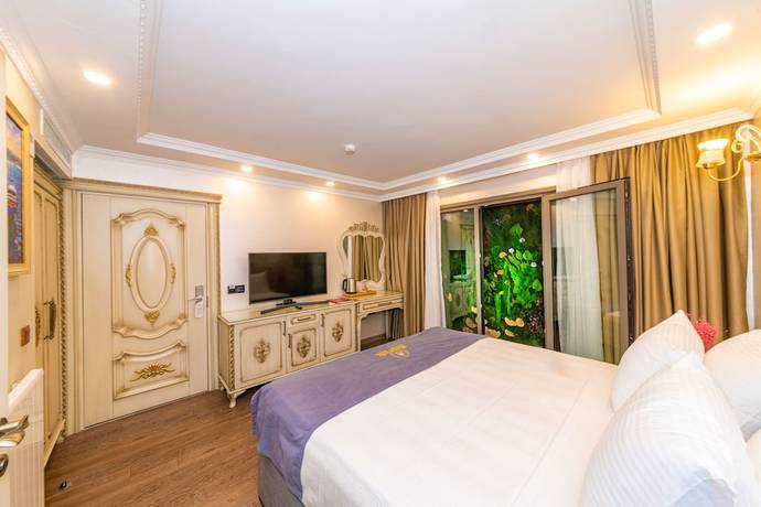 Imagen de la habitación del CZN Burak Hotel. Foto 15