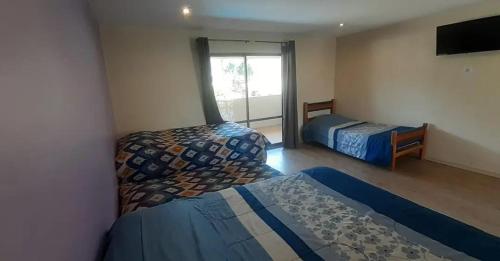 Imagen de la habitación del Caba&ntilde;as Tahiken. Foto 10