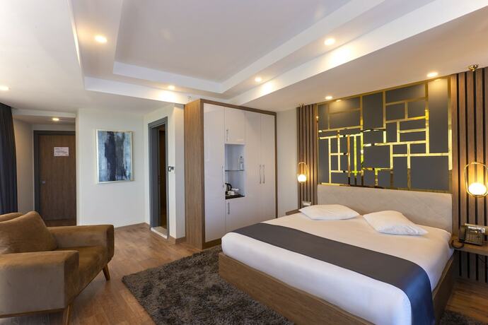 Imagen de la habitación del Cabir Deluxe Hotel. Foto 13