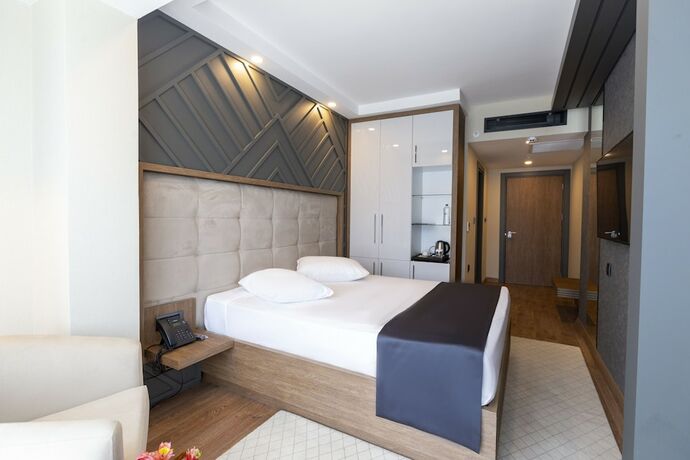 Imagen de la habitación del Cabir Deluxe Hotel. Foto 14