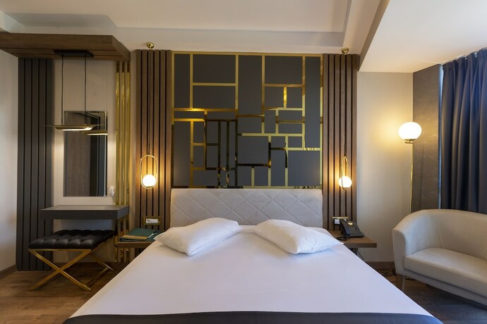 Imagen de la habitación del Cabir Deluxe Hotel. Foto 17