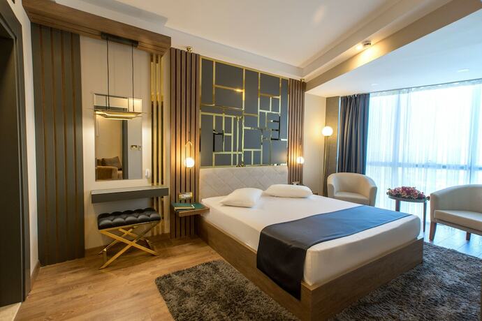 Imagen de la habitación del Cabir Deluxe Hotel. Foto 19