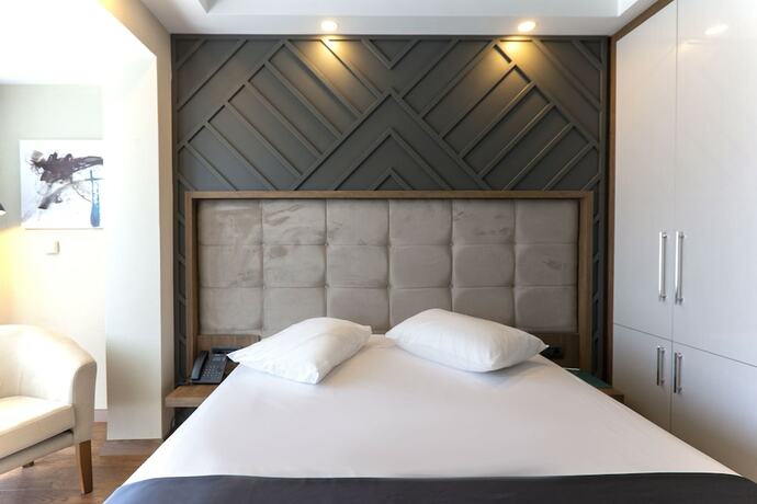 Imagen de la habitación del Cabir Deluxe Hotel. Foto 20