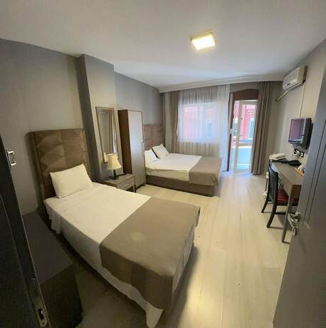 Imagen de la habitación del Cadde 7 Otel. Foto 17