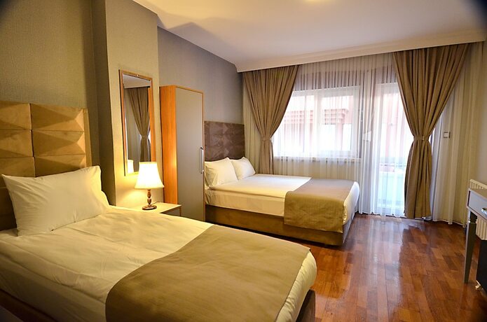 Imagen de la habitación del Cadde 7 Otel. Foto 19