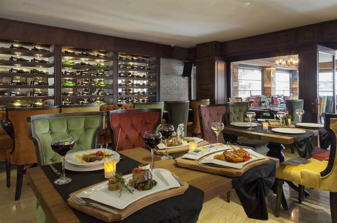 Imagen del bar/restaurante del Cadence Design Hotel. Foto 4
