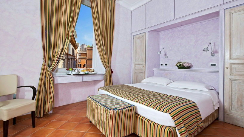 Imagen de la habitación del Caesar House Residenze Romane. Foto 5