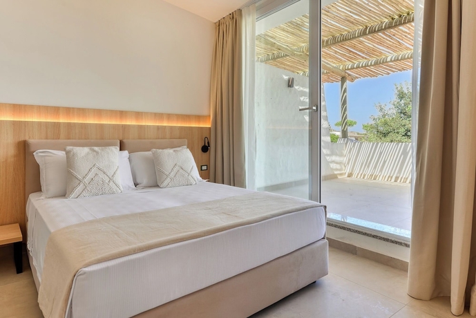 Imagen de la habitación del Cala Lupo Resort. Foto 13