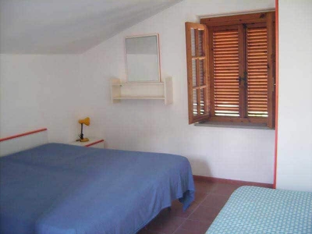 Imagen de la habitación del Cala Petrosa Resort. Foto 7