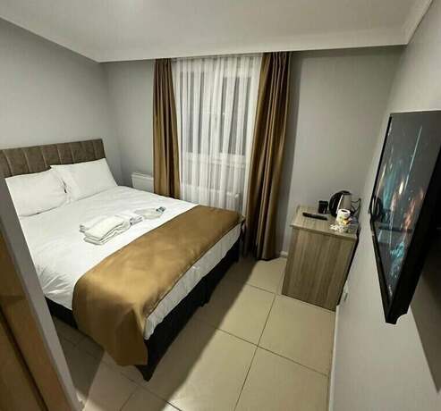 Imagen de la habitación del Camellia Suit Hotel. Foto 10