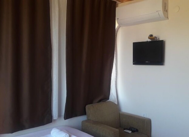 Imagen de la habitación del Camlaralti Pansiyon. Foto 2