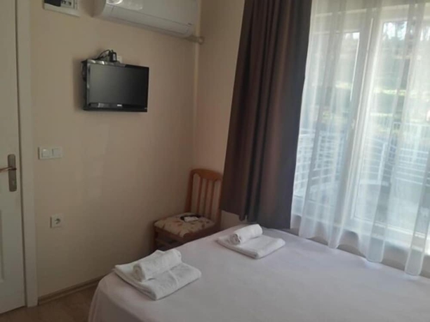 Imagen de la habitación del Camlaralti Pansiyon. Foto 4