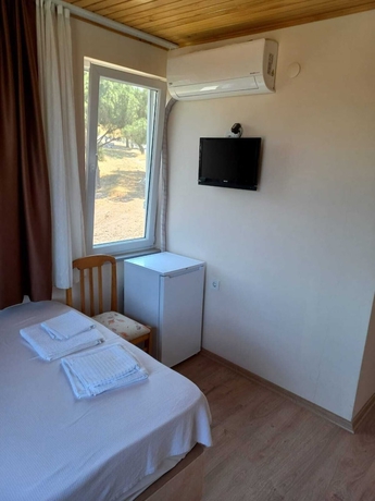 Imagen de la habitación del Camlaralti Pansiyon. Foto 5