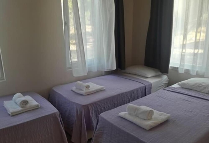 Imagen de la habitación del Camlaralti Pansiyon. Foto 7