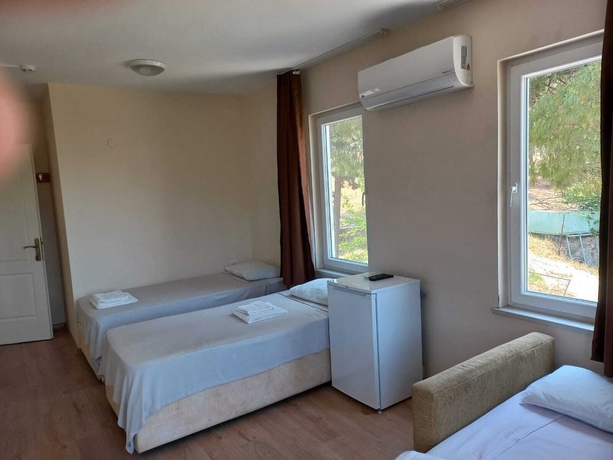 Imagen de la habitación del Camlaralti Pansiyon. Foto 9