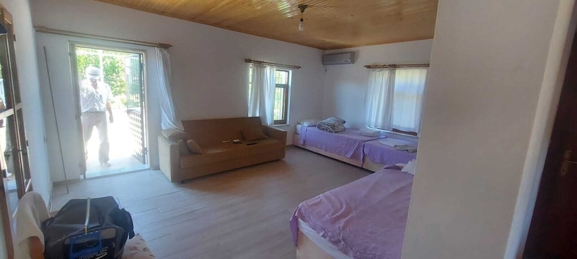 Imagen de la habitación del Camlaralti Pansiyon. Foto 11