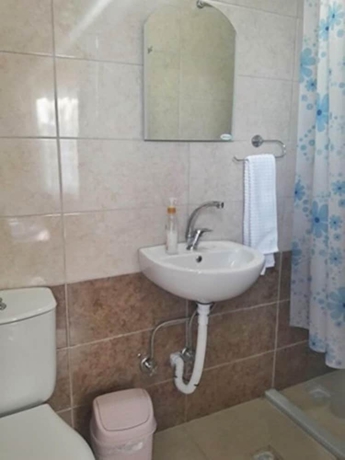 Imagen de la habitación del Camlaralti Pansiyon. Foto 13
