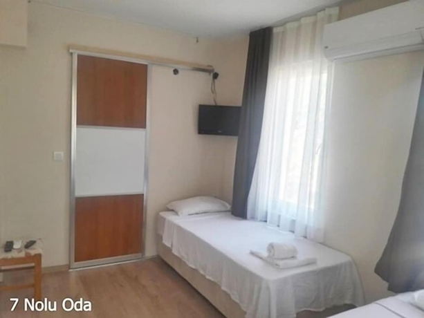 Imagen de la habitación del Camlaralti Pansiyon. Foto 16