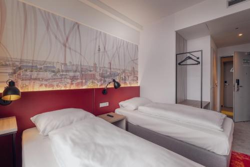 Imagen de la habitación del Campanile Berlin Brandenburg Airport. Foto 14