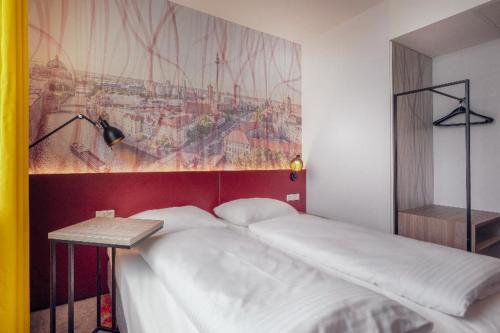 Imagen de la habitación del Campanile Berlin Brandenburg Airport. Foto 15