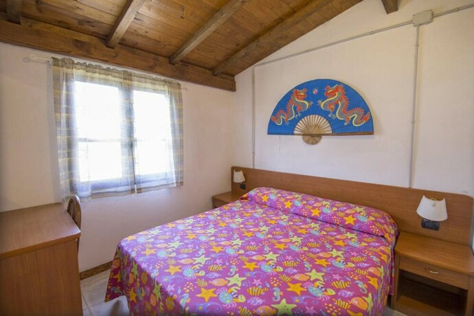 Imagen de la habitación del Campeggio Villaggio Sos Flores. Foto 17