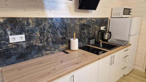 Imagen de la habitación del Camping KLIF-nowe KLIMATYZOWANE domki, 400m od centrum Rewala, 30m od MORZA. Foto 17