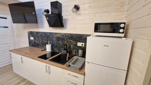 Imagen de la habitación del Camping KLIF-nowe KLIMATYZOWANE domki, 400m od centrum Rewala, 30m od MORZA. Foto 18