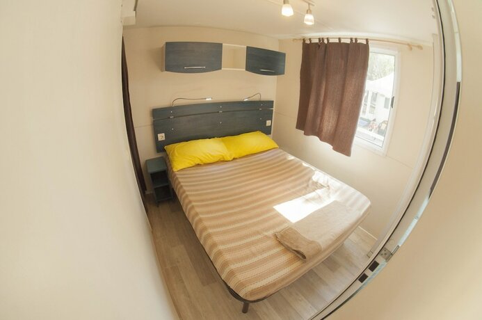 Imagen de la habitación del Camping Village Mare Pineta. Foto 13
