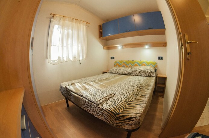Imagen de la habitación del Camping Village Mare Pineta. Foto 15