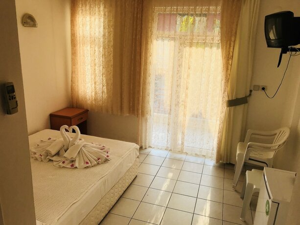 Imagen de la habitación del Camyuva Motel. Foto 19