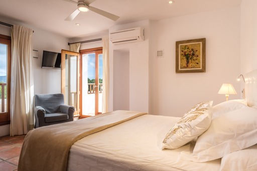 Imagen de la habitación del Can Lluc Boutique Hotel and Luxury Villas. Foto 2