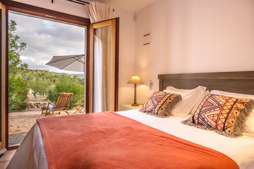 Imagen de la habitación del Can Lluc Boutique Hotel and Luxury Villas. Foto 6