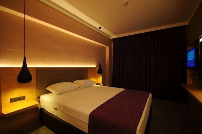 Imagen de la habitación del Candan City Beach Hotel. Foto 8
