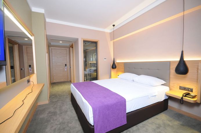Imagen de la habitación del Candan City Beach Hotel. Foto 13