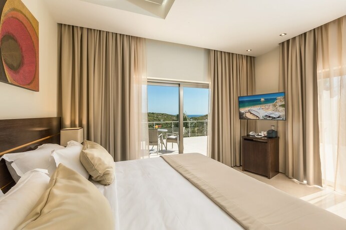 Imagen de la habitación del Caneiros Luxury House and Suites. Foto 15