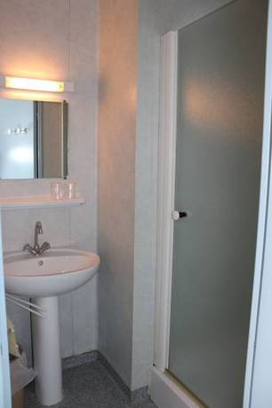 Imagen de la habitación del Cap France Le Home Du Cotentin. Foto 7