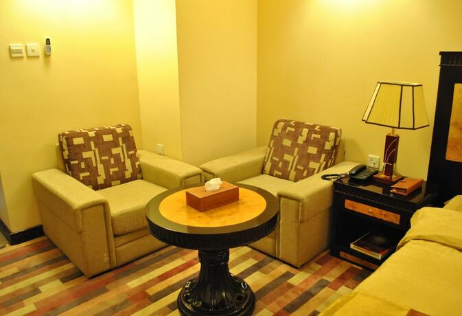 Imagen de la habitación del Capital O 155 Dmas Hotel. Foto 14