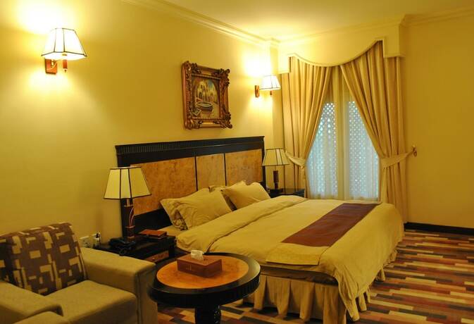 Imagen de la habitación del Capital O 155 Dmas Hotel. Foto 15