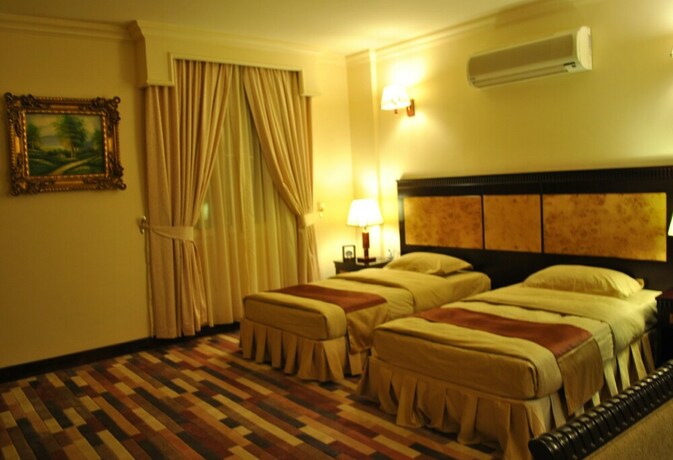 Imagen de la habitación del Capital O 155 Dmas Hotel. Foto 18