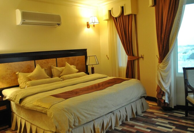 Imagen de la habitación del Capital O 155 Dmas Hotel. Foto 22