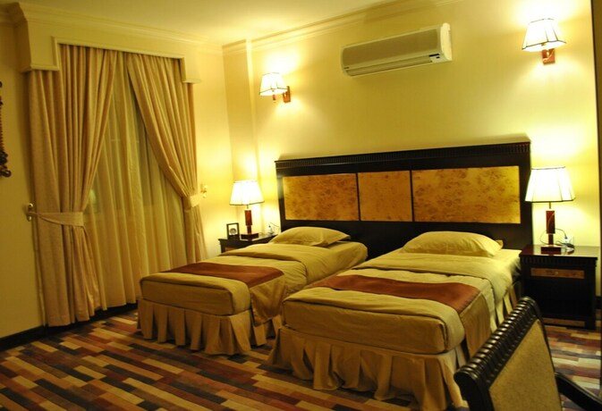 Imagen de la habitación del Capital O 155 Dmas Hotel. Foto 23