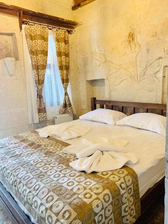 Imagen de la habitación del Cappadocia Caves Hotel, Goreme. Foto 6